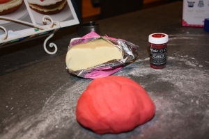 Marzipan before and after food colouring paste.