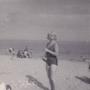 Mum pictured long me. Here, Mum is the same age as I am now - looking efortlessly glam on the beach!